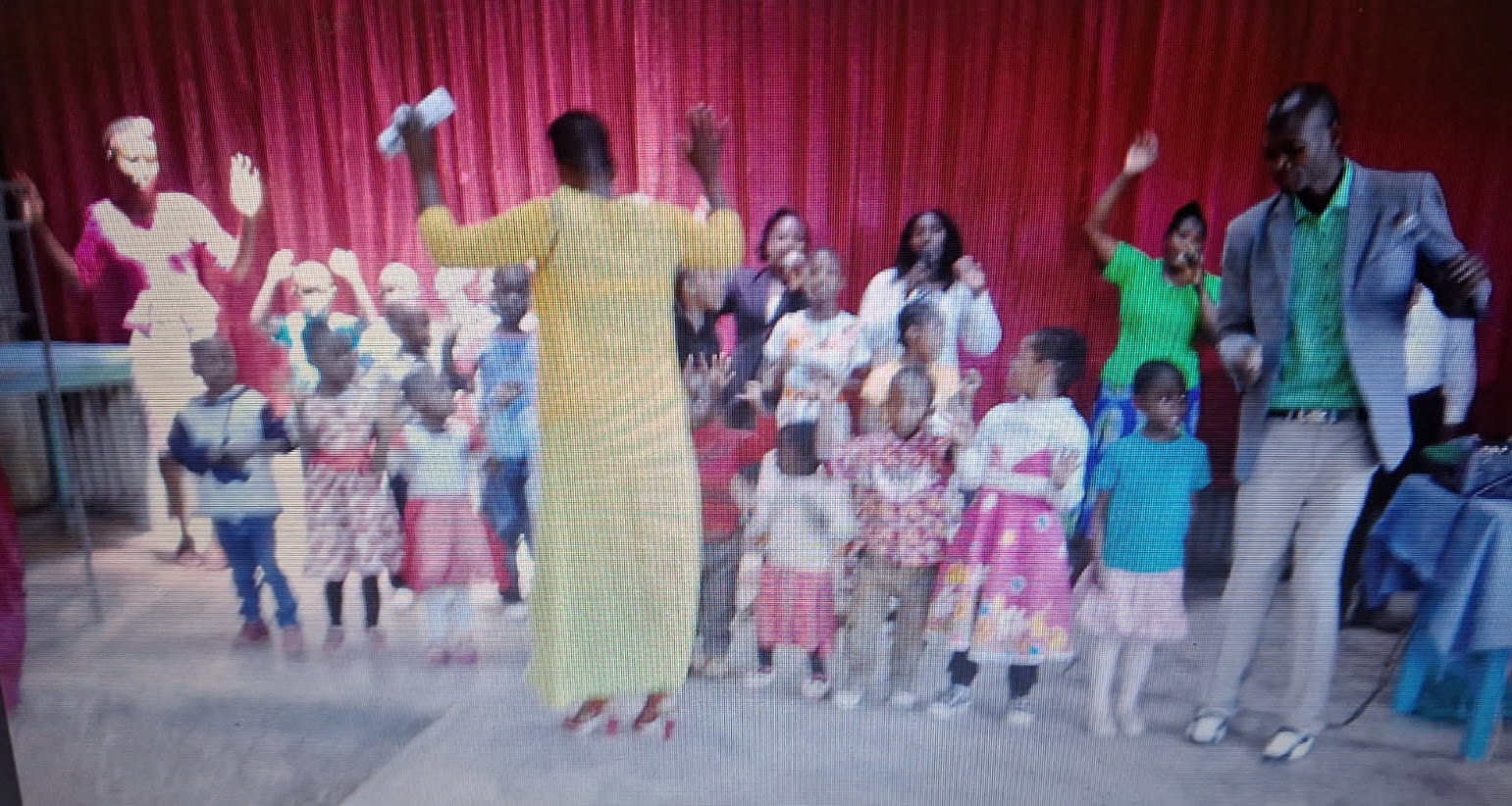 Children worshipping during a ministry service