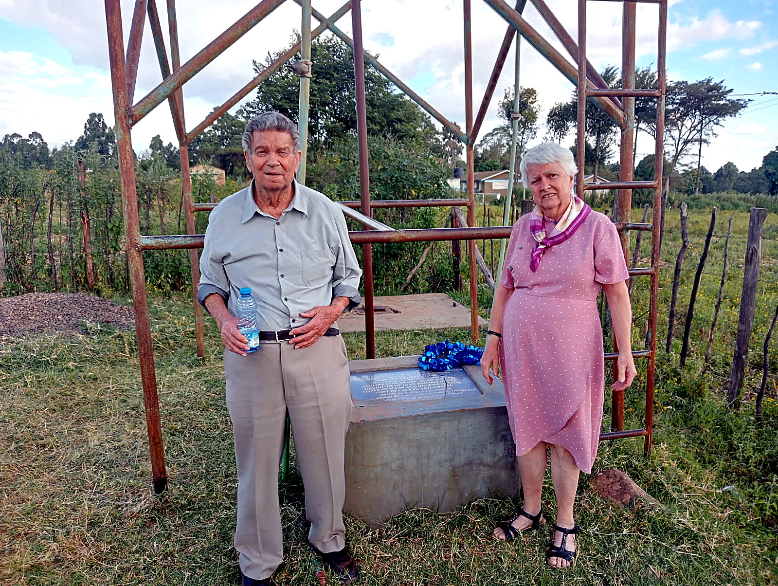 John and Iris at a completed community water well