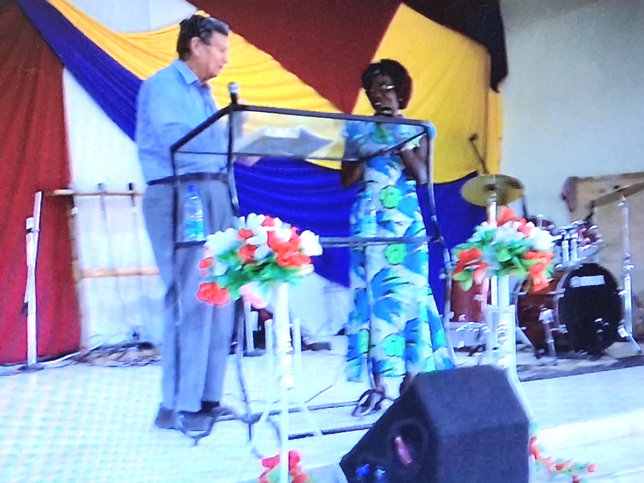Iris preaching at a local church